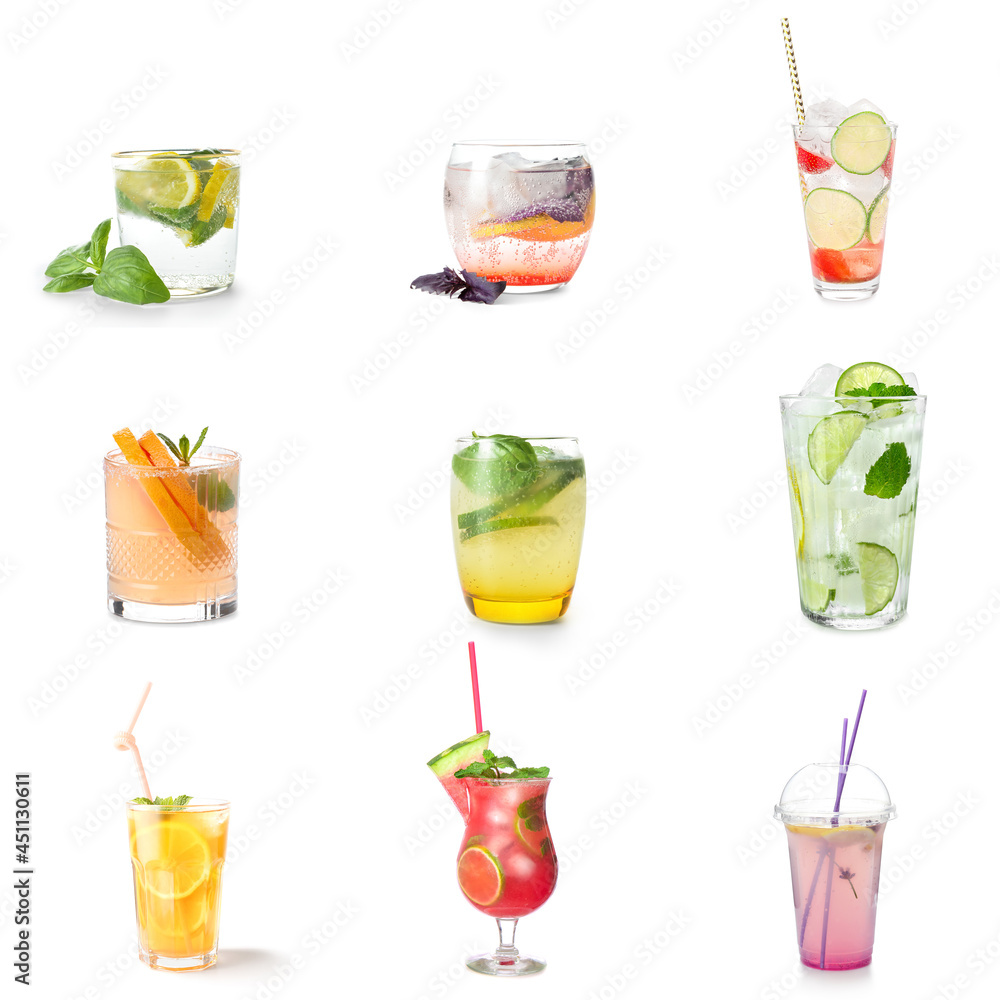 Glasses of tasty cold lemonade with basil on white background Glasses of tasty cold lemonade with basil on white background