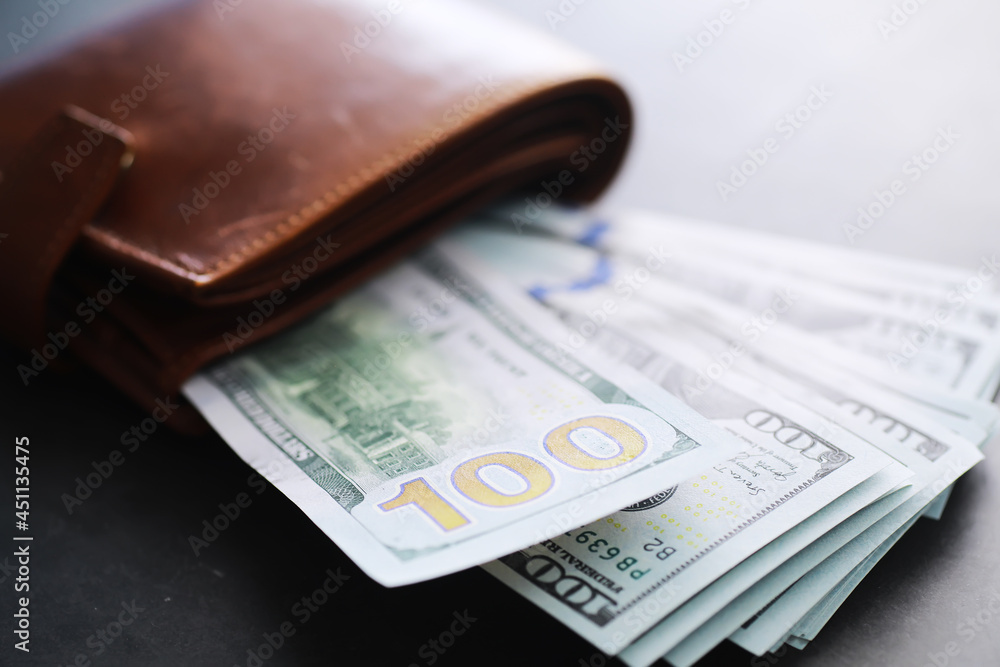 Group of money stack of 100 US dollars banknotes a lot of the background texture. Cash money in a large pile as a finance background. Group of money stack of 100 US dollars banknotes a lot of the background texture. Cash money in a large pile as a finance background.