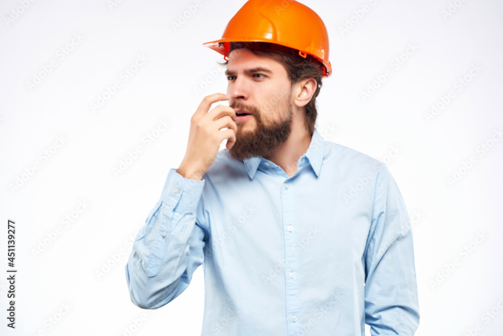 bearded man work in the construction industry protective uniform
