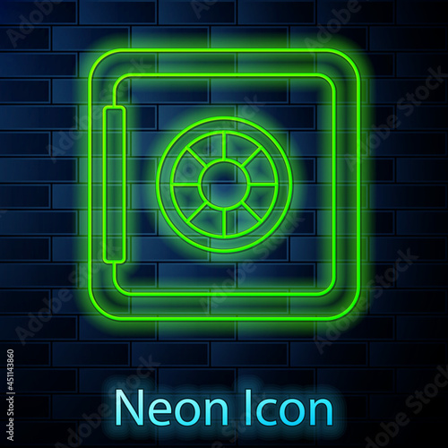 Glowing neon line Safe icon isolated on brick wall background. The door safe a bank vault with a combination lock. Reliable Data Protection. Vector
