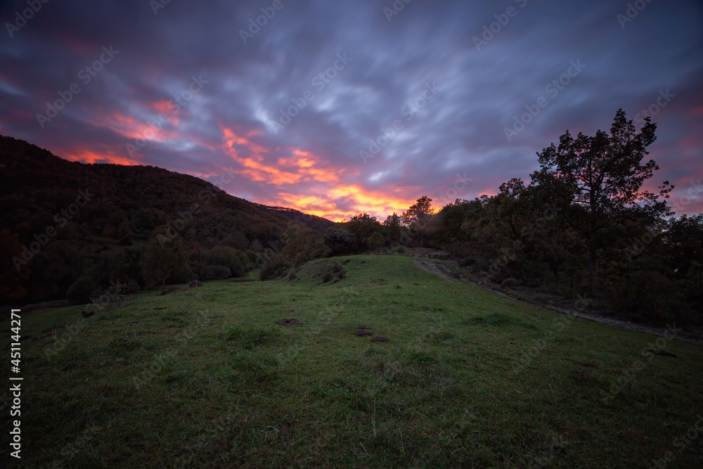 Colorful sunset light in a Spanish Montseny Mountain in autumn time