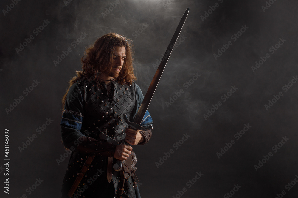 Medieval knight with sword in armor as style Game of Thrones Medieval knight with sword in armor as style Game of Thrones
