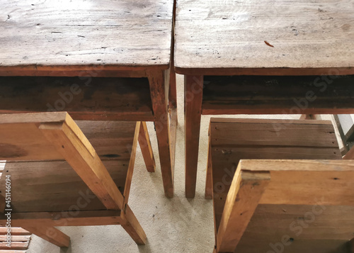 Old wooden desk and chair for students