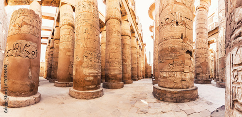 Karnak Temple columns with ancient carvings, Luxor, Egypt photo