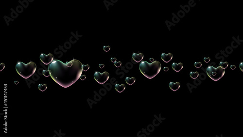 Black background with rainbow colored heart-shaped soap bubbles for Valentine card. Vector