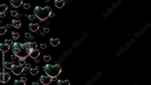 Black background with rainbow colored heart-shaped soap bubbles for Valentine card. Vector