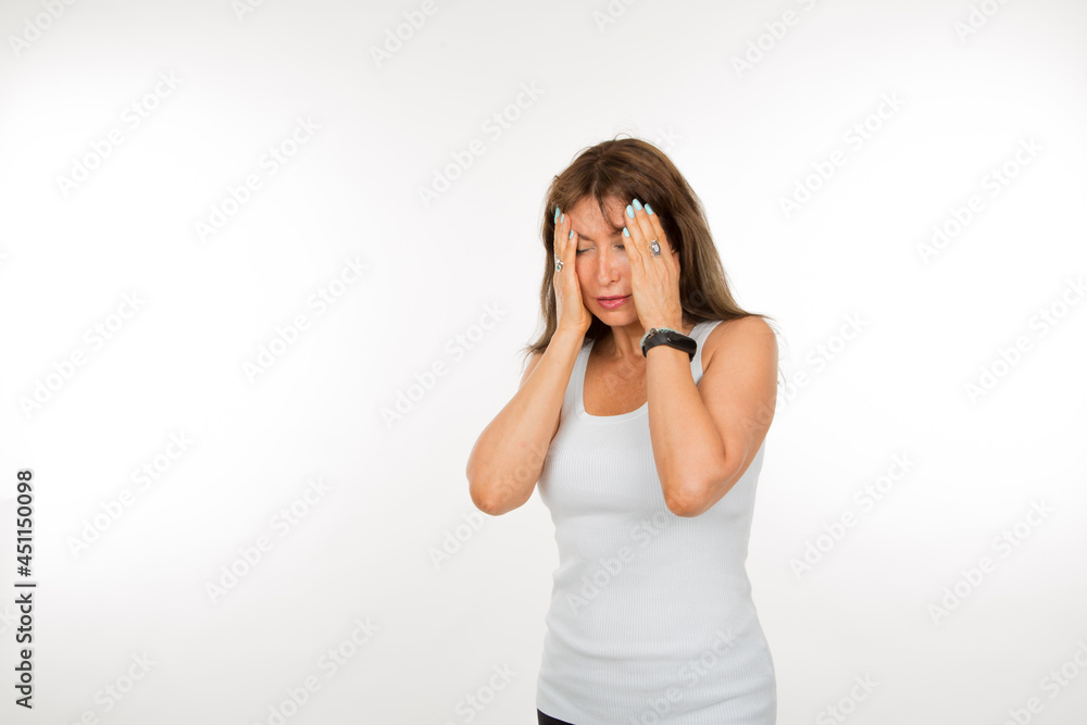 senior white woman with hands on face on white background senior white woman with hands on face on white background