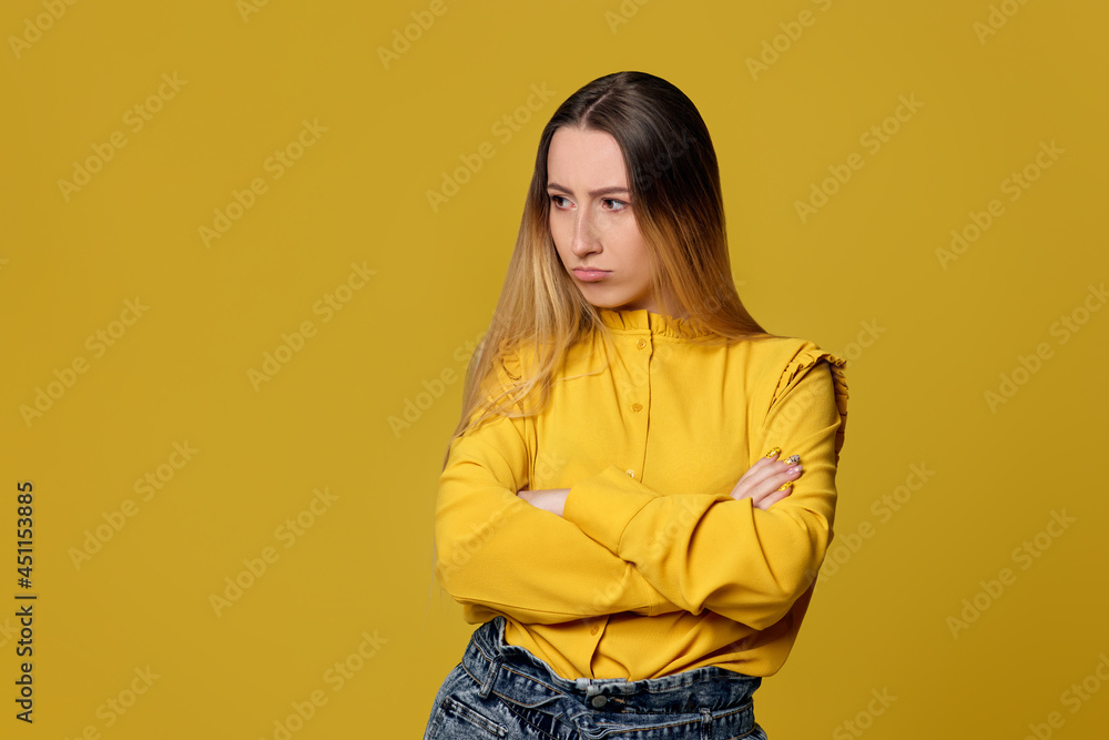 upset unsatisfied woman on yellow background. Human emotions upset unsatisfied woman on yellow background. Human emotions