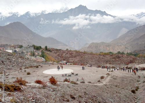 A panoramic view of Mustang Valley on the backdrop of Mt. Dhaulagiri 8167 m  seen from Muktinath in Nepal. This is most popular pilgrimage and tourist spot of Nepal, as visitors’ throng here in large. photo