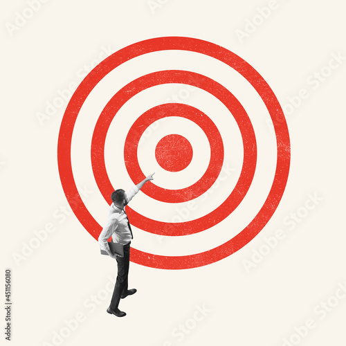 Art collage. Young man, office worker, employee standing in front of target isolated on light background. Concept of finance, economy, goals, achievements, occupation photo