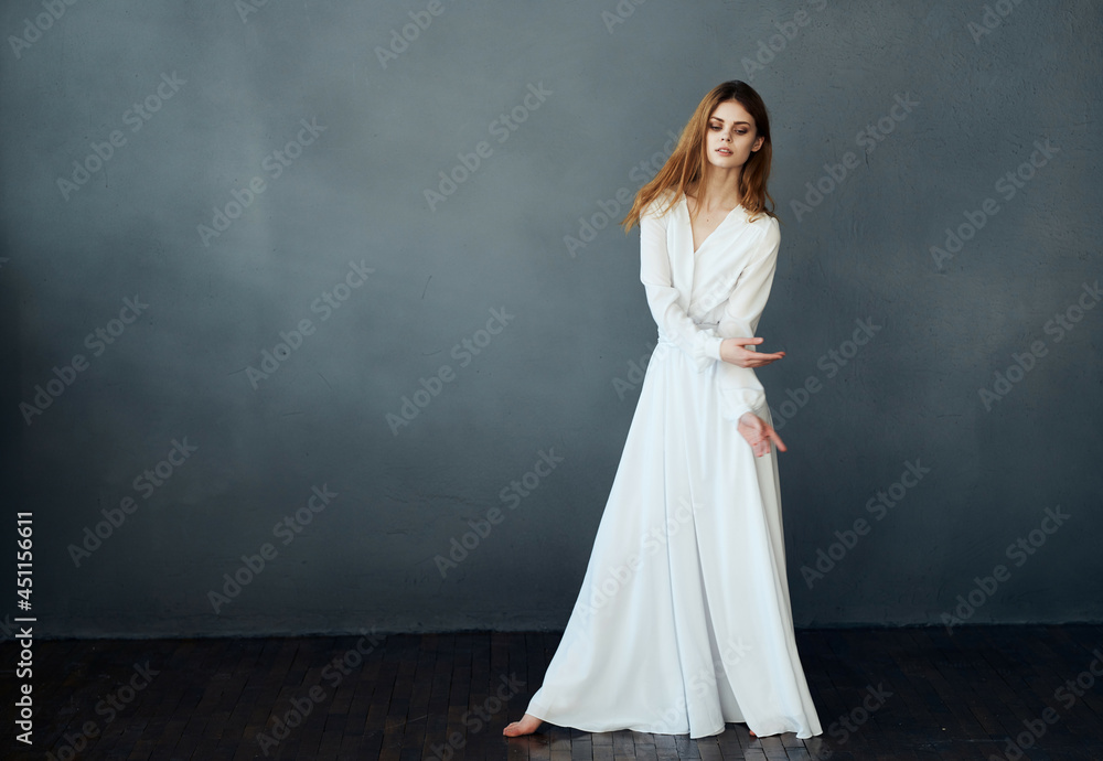 portrait of woman in white dress in full growth dance glamor isolated background portrait of woman in white dress in full growth dance glamor isolated background