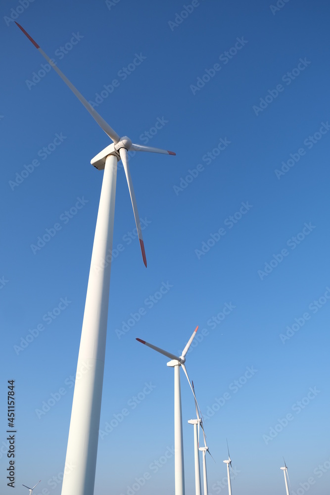 wind turbine on a blue sky