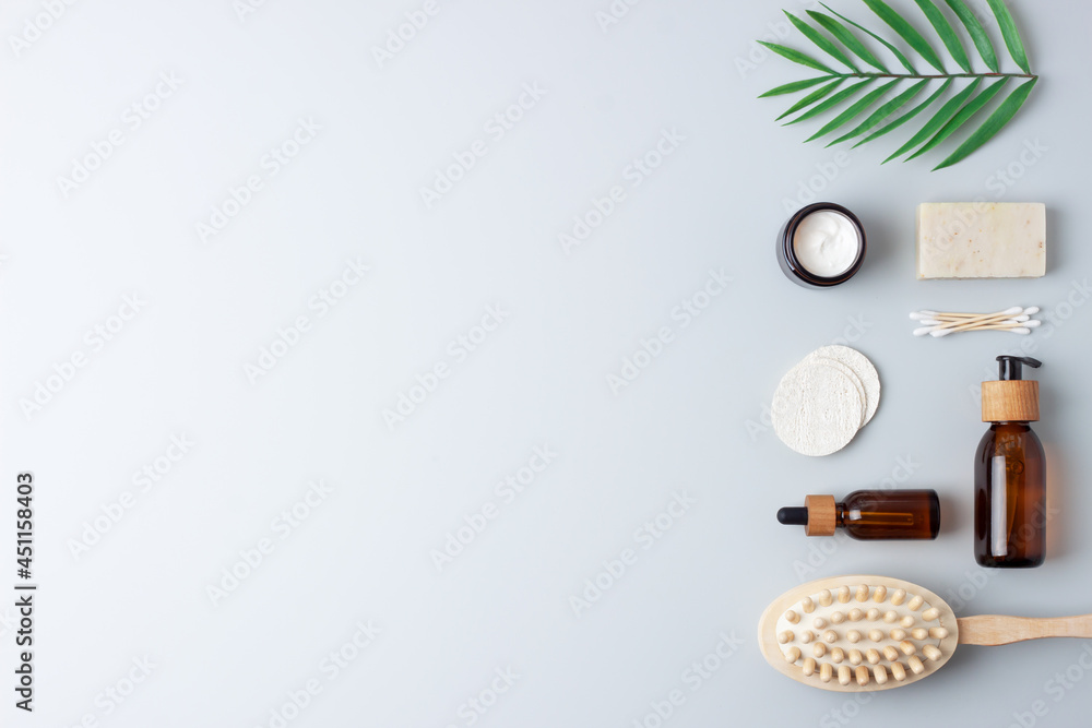 Zero waste, sustainable and eco-friendly lifestyle. Bathroom natural products from reusable materials on grey background. Flat lay, copy space