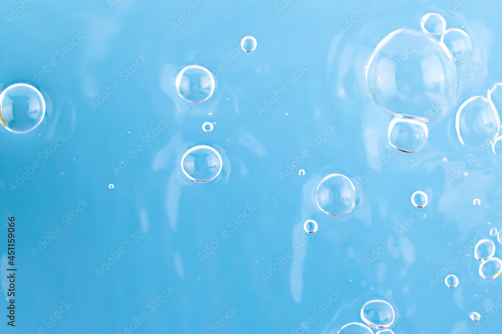 defocus water droplets on a blue background