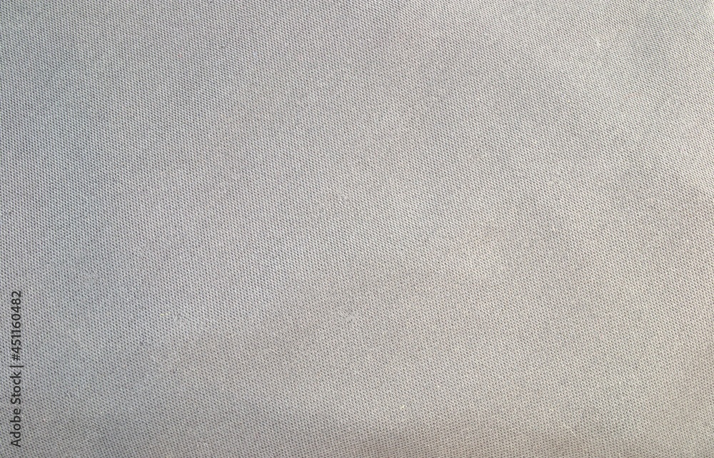 The texture of a gray woven fabric. Abstraction The texture of a gray woven fabric. Abstraction