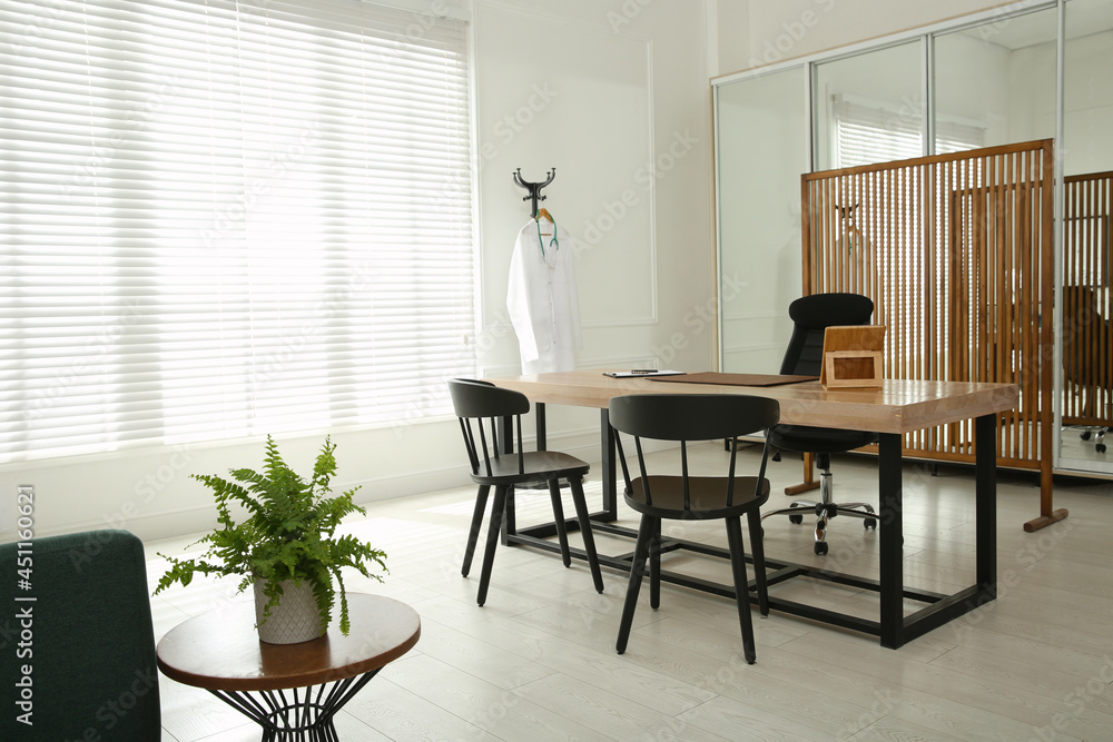 Fototapeta premium Modern medical office interior with doctor's workplace