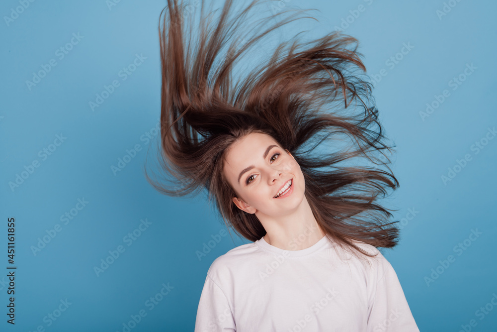 Portrait of dreamy crazy funky lady look camera shake head on blue background Portrait of dreamy crazy funky lady look camera shake head on blue background