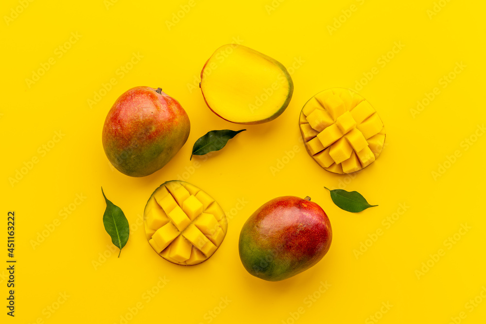 Mango fruit slices and cubes. Tropical fruits layout
