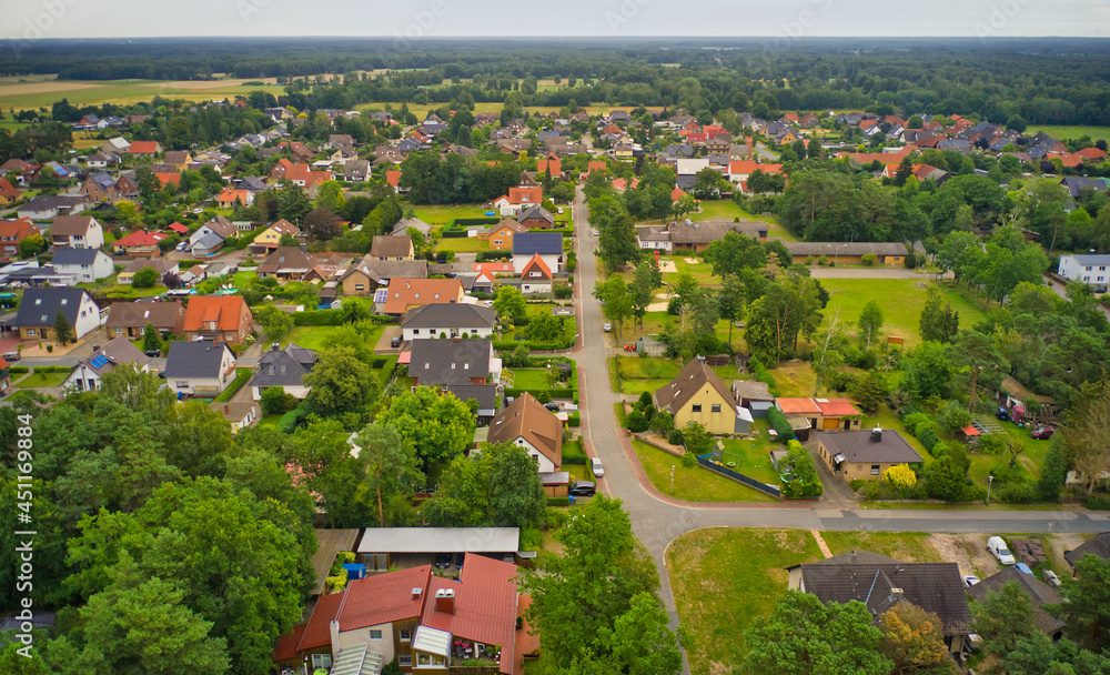 Suburb in Germany with houses arranged in rows for families with close neighborhood and small gardens