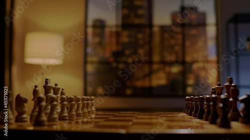 Wallpaper Mural Black and white chess pieces stand on board in semidark room Torontodigital.ca