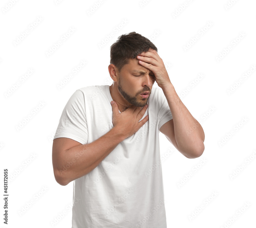 Man suffering from pain during breathing on white background Man suffering from pain during breathing on white background