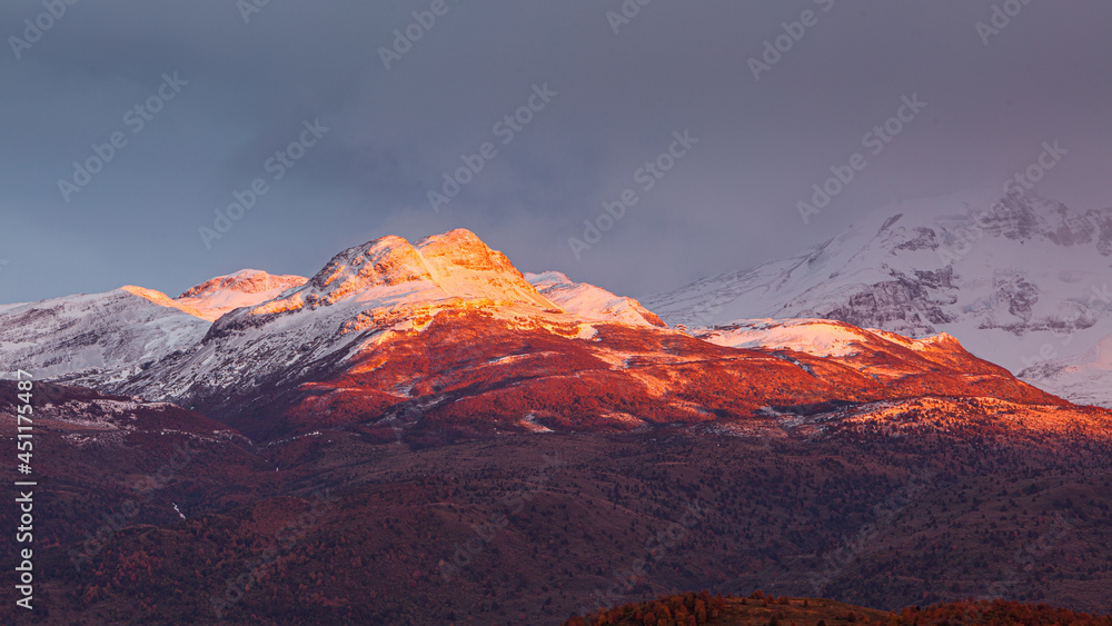Autumn in Patagonia: sunrise over snow covered mountains

