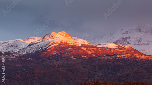 Autumn in Patagonia: sunrise over snow covered mountains 