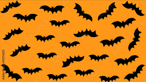 Halloween design with orange background and silhouettes of bats