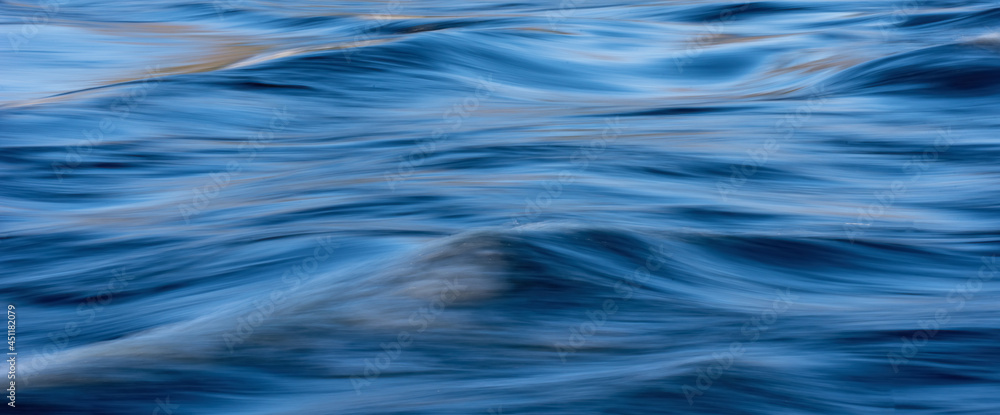 Blue tones water surface as background Blue tones water surface as background