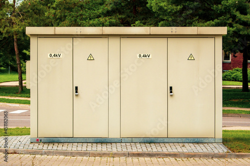 Electric cabinet with warning signs