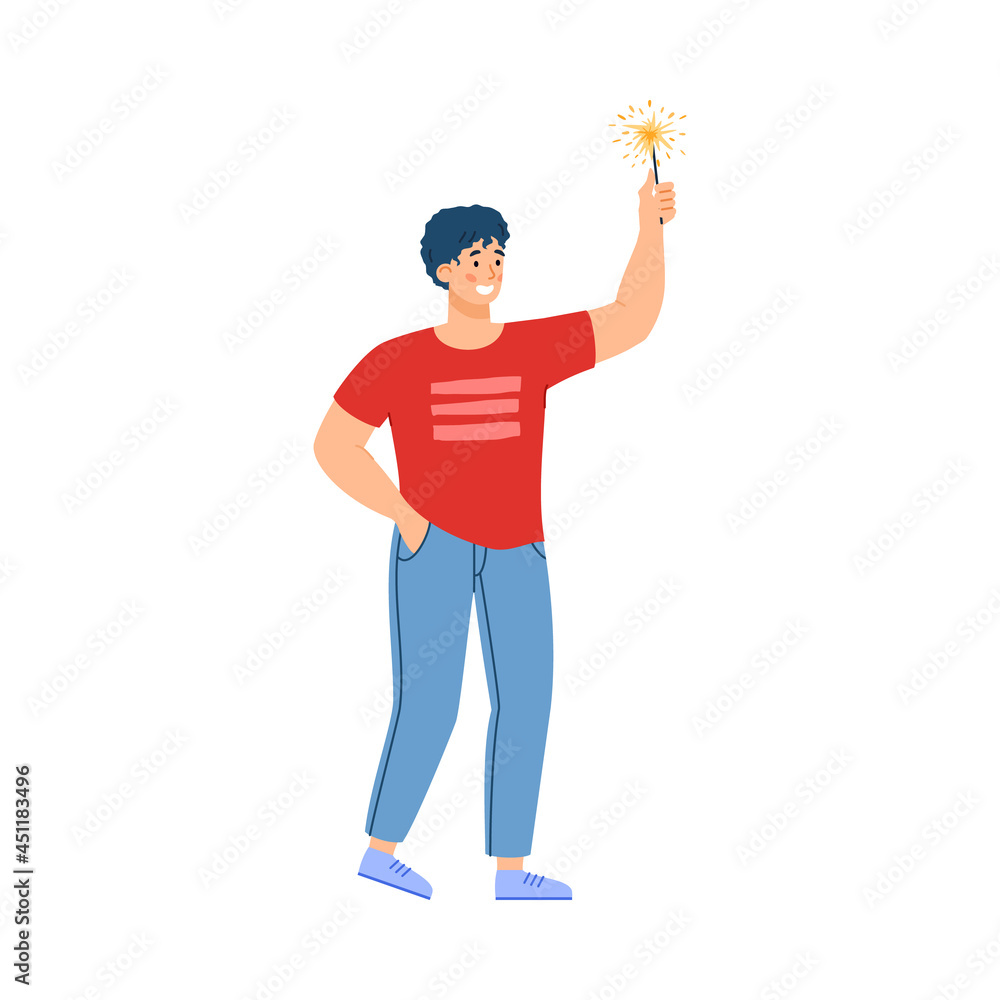 Young man with holiday sparkler in hand having fun at christmas party. Young man with holiday sparkler in hand having fun at christmas party.