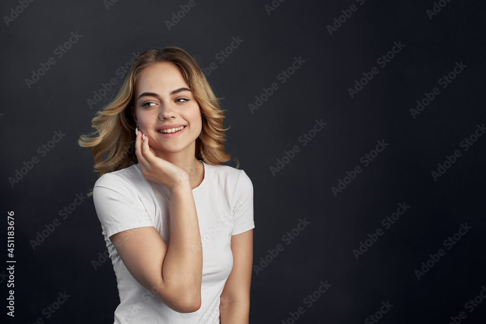 pretty woman in white t-shirt fashion studio posing pretty woman in white t-shirt fashion studio posing