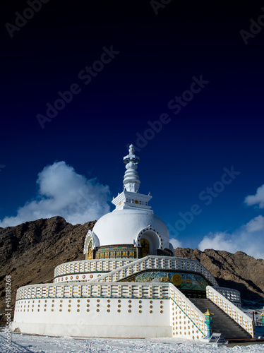 Shanti Stupa is a Buddhist white-domed stupa on a hilltop in Chanspa, Leh district, Ladakh, India photo