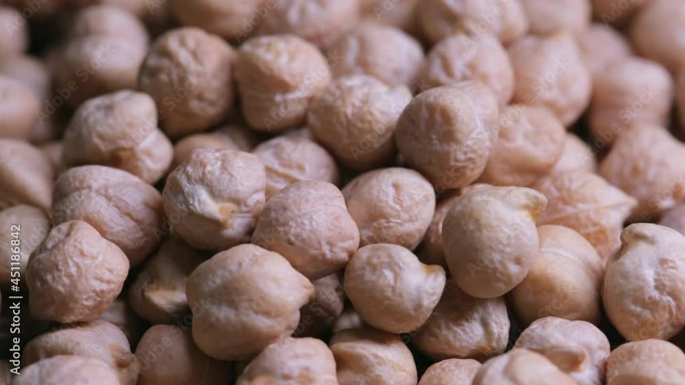 Closeup macro chickpeas garbanzo beans rotating. 
