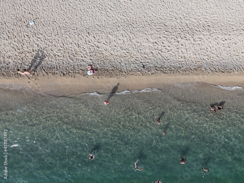 Aerial view of kanali beach crowded with tourists, famous tourist destination in preveza, epirus, greece photo