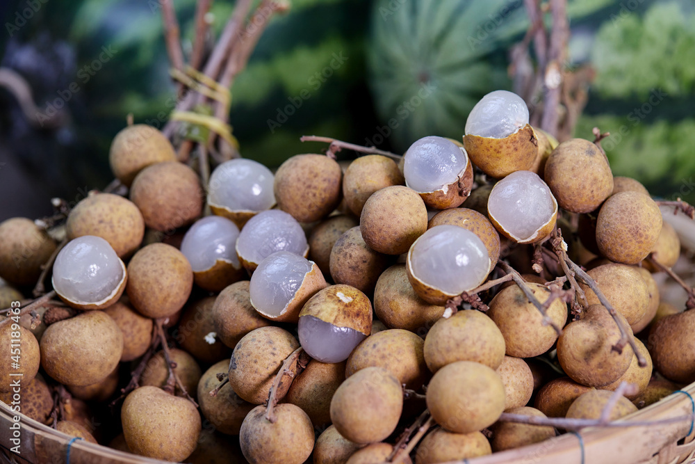 closeup bunch of ripe longan fruit on bamboo basket closeup bunch of ripe longan fruit on bamboo basket