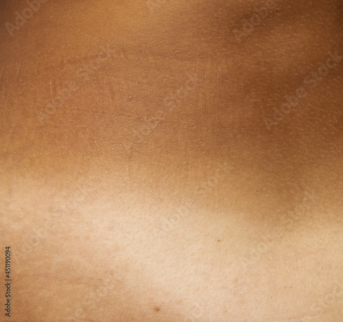 Wallpaper Mural contrast of tanned and fair skin as background Torontodigital.ca