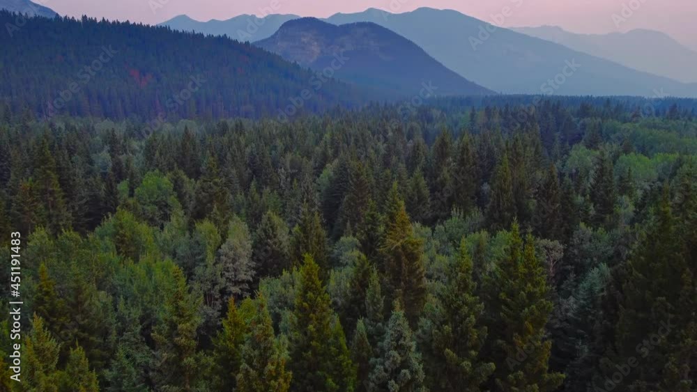 Mountains and forest on smoky evening with road Mountains and forest on smoky evening with road
