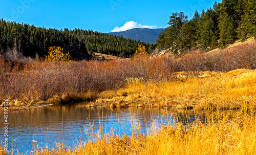 View of Lake and forest in the Rocky Mountains of Colorado in Autumn.