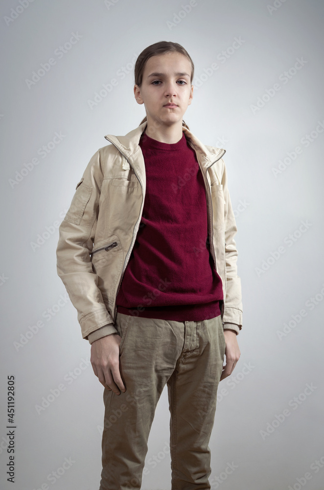 Fototapeta premium Male teenager with thumbs in pockets