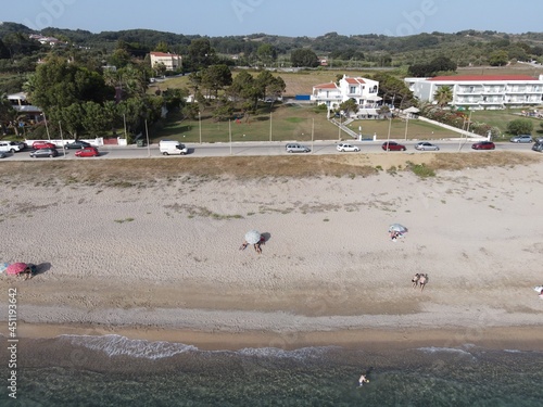 Aerial view of kanali beach crowded with tourists, famous tourist destination in preveza, epirus, greece