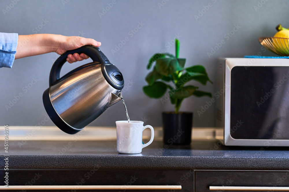 A Glass Electric Kettle With Boiling Water Inside Stock Photo