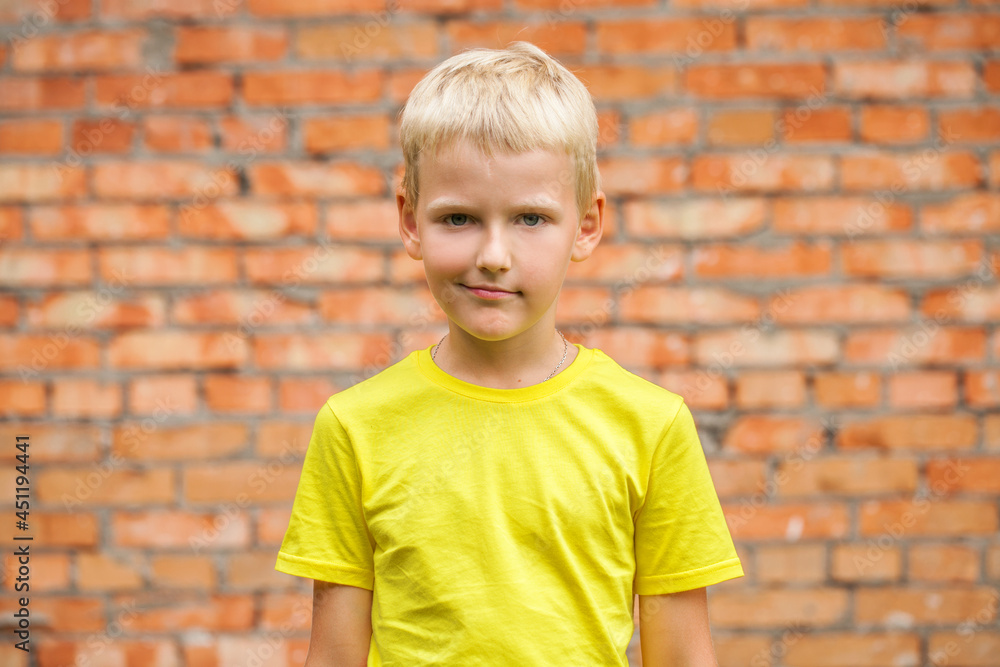 Blonde little boy in a summer park Blonde little boy in a summer park
