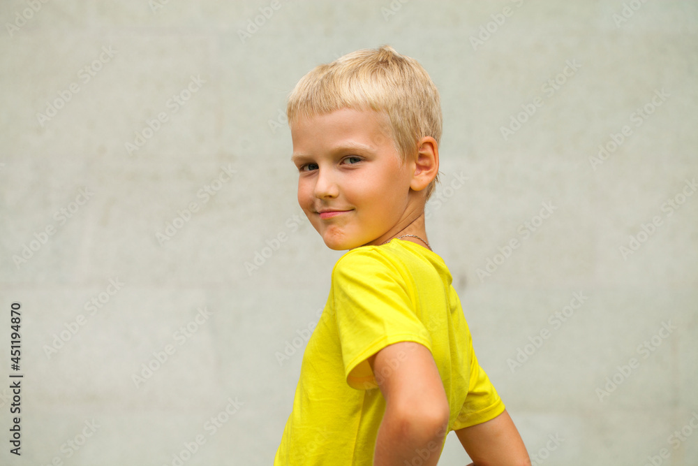 Blonde little boy in a summer park Blonde little boy in a summer park