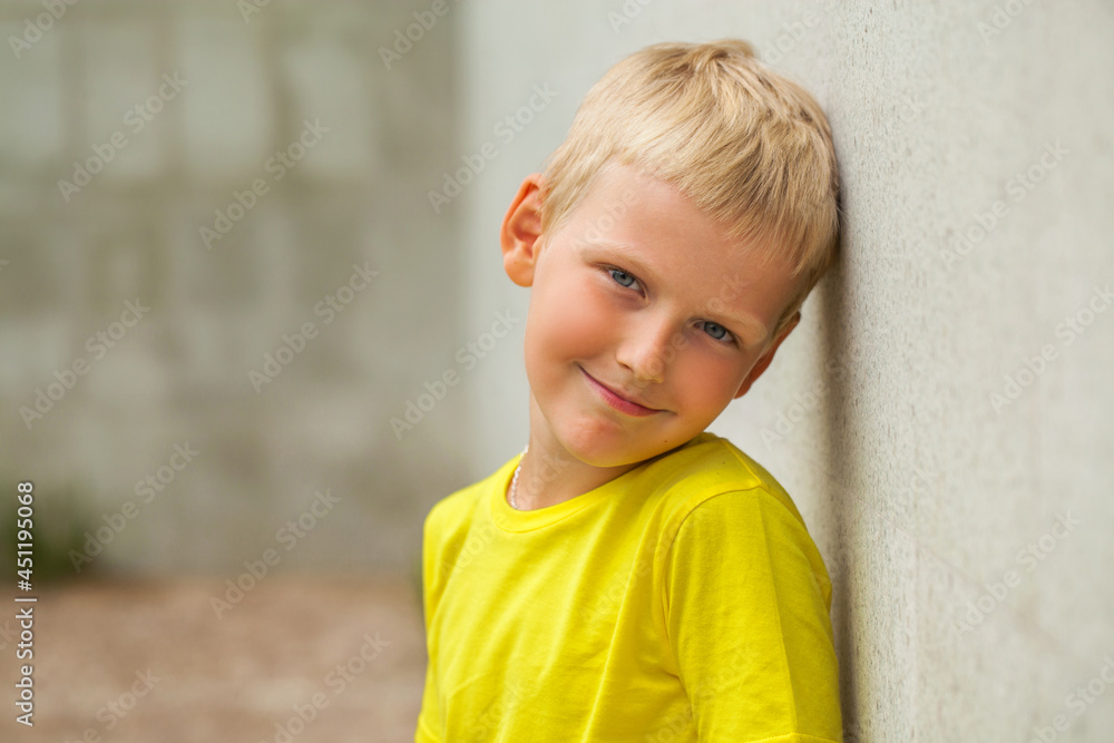 Blonde little boy in a summer park Blonde little boy in a summer park