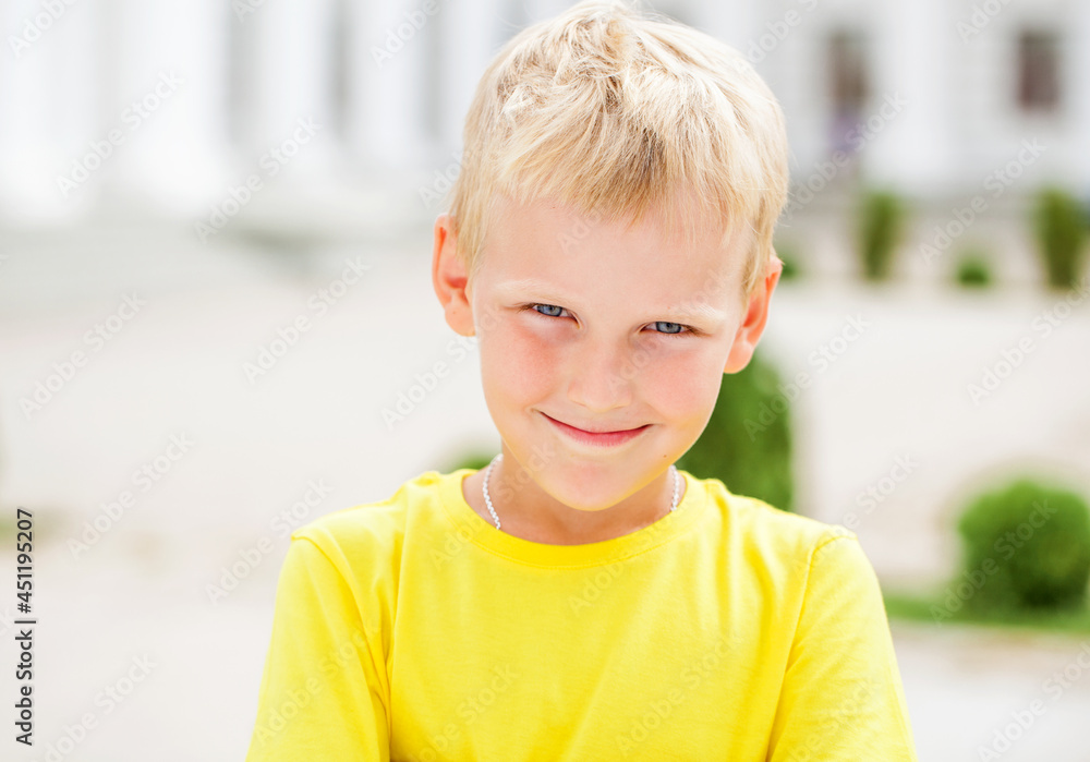 Blonde little boy in a summer park Blonde little boy in a summer park