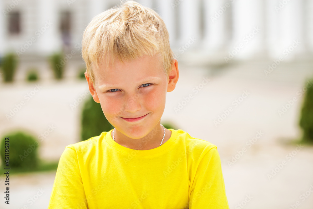 Blonde little boy in a summer park Blonde little boy in a summer park