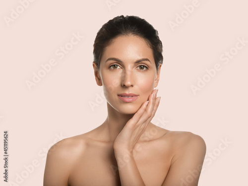 Beautiful woman natural make up studio portrait healthy beauty skin smile female young model