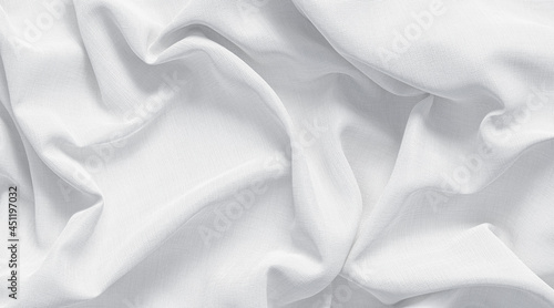 Blank white crumpled fabric material mock up, top view photo