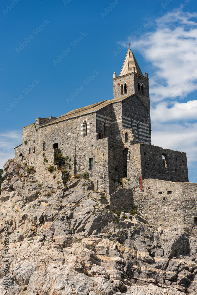 Headland in Portovenere or Porto Venere with the medieval Church of San Pietro (St. Peter, 1198), UNESCO world heritage site. La Spezia, Liguria, Italy, Europe.